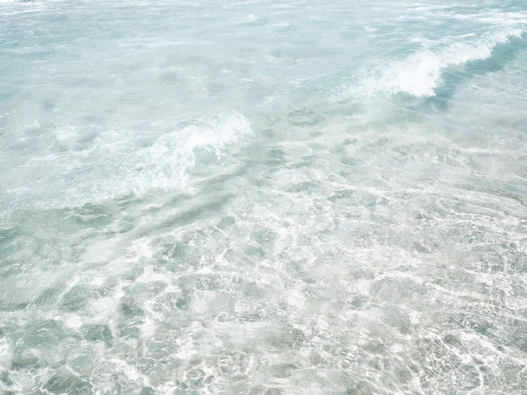 Pastel clear, light blue ocean water